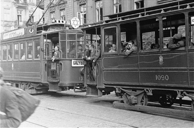 Jews ride in a streetcar marked with a Jewish star in the Warsaw ghetto